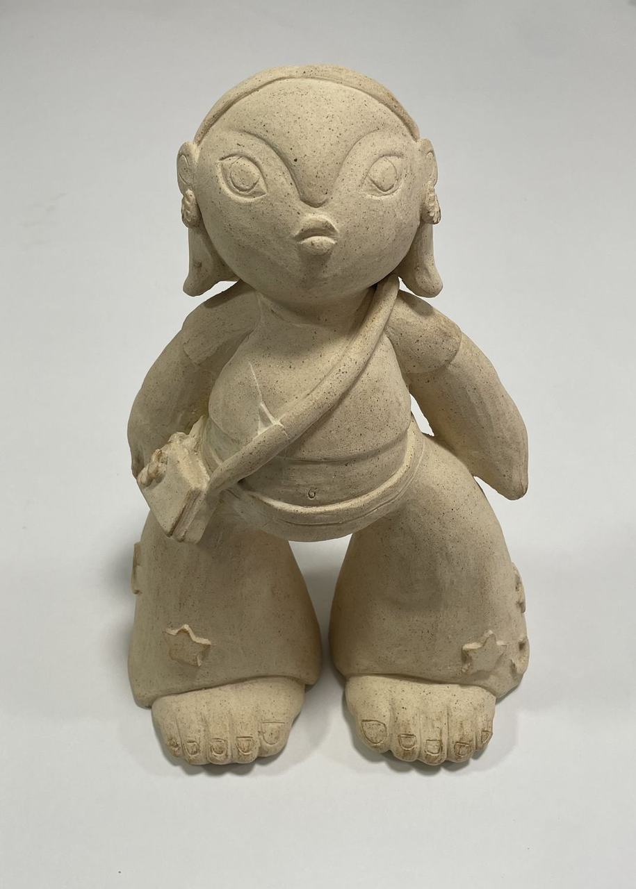 Muñeca de barro sin cocer, todavía en crudo